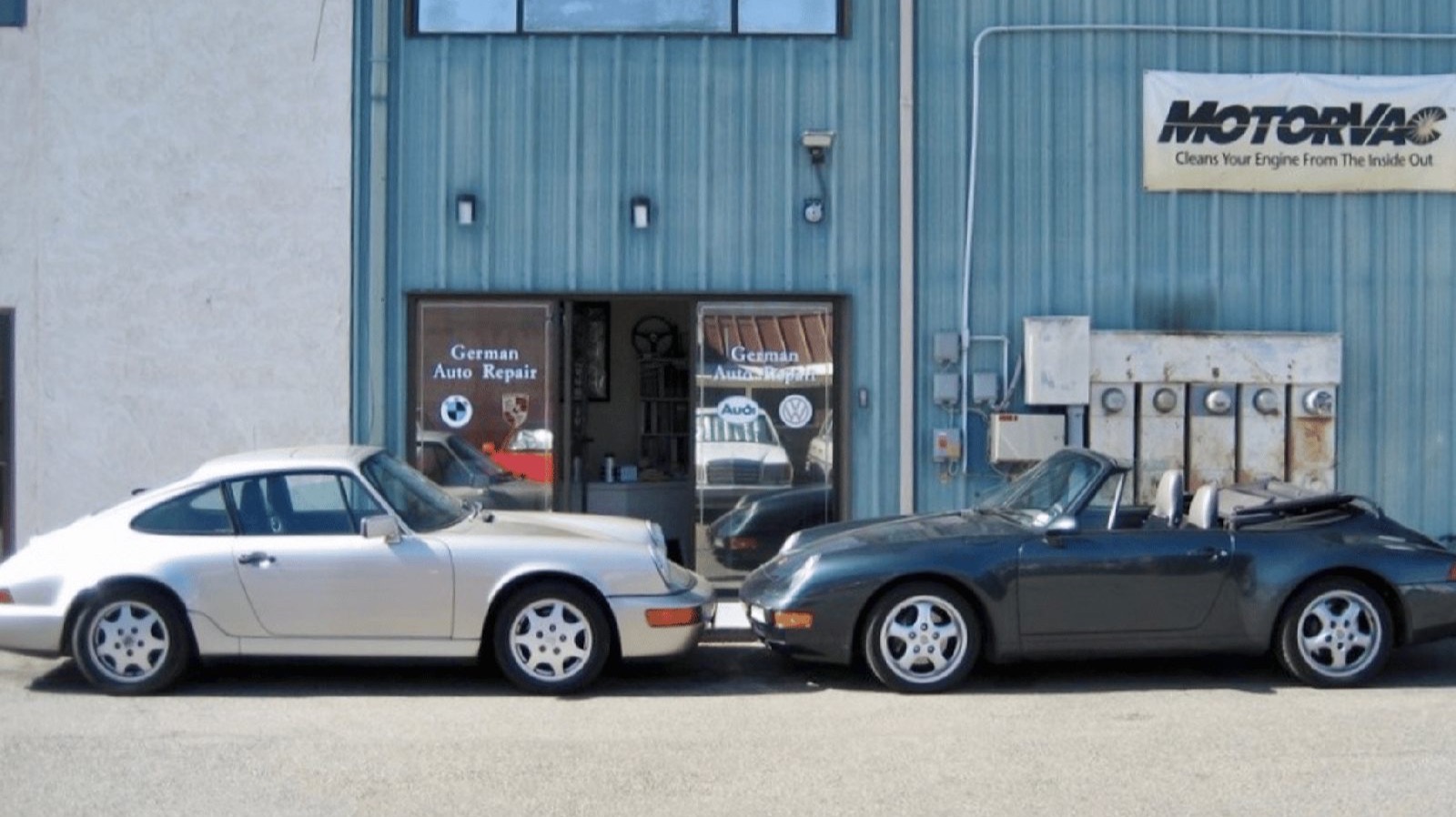 Two Porsche 911s parked outside the German Auto Repair shop in Goleta