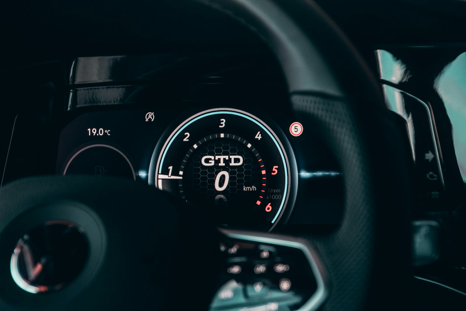Instrument cluster of a Volkswagen GTD showing tachometer and warning lights